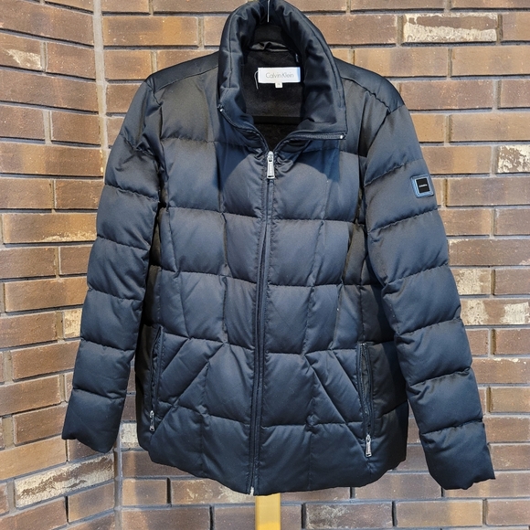 Calvin Klein black puffer coat zip pockets outside snap pocket inside